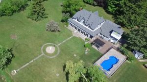 A large home for sale. Aerial drone photo of real estate in Ontario